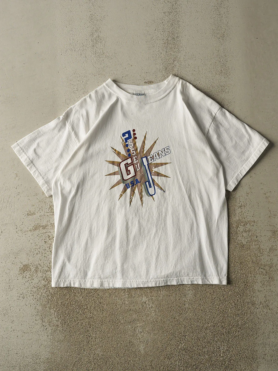 Vintage 96' White Guess Jeans Tee (L/XL) sold by Rebalance Vintage