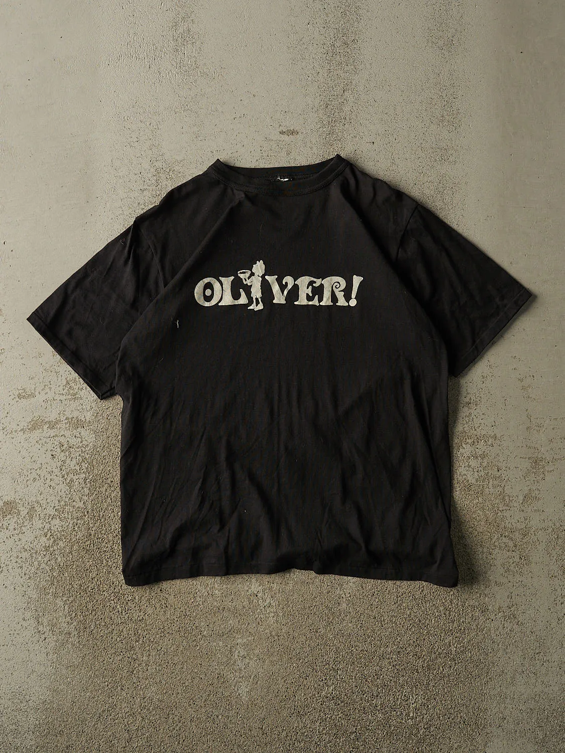 Vintage 80s Black "Oliver" Theatre Tee (M/L) sold by Rebalance Vintage