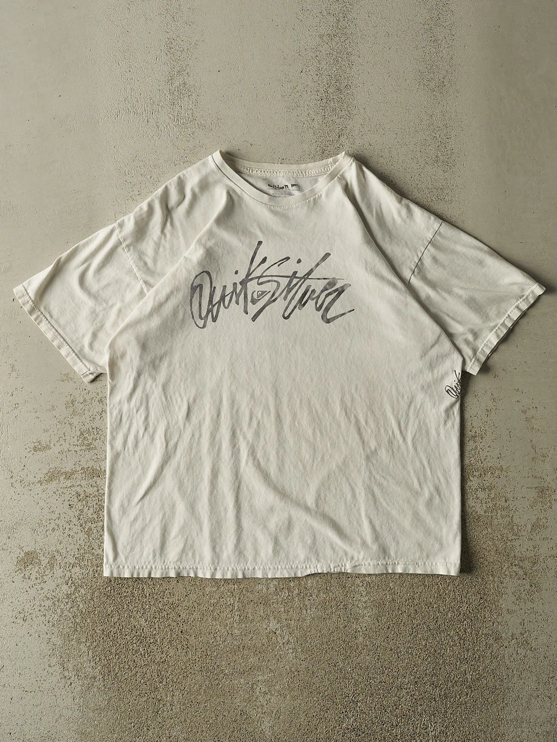 Vintage Y2K White Quiksilver Tee (L/XL) sold by Rebalance Vintage