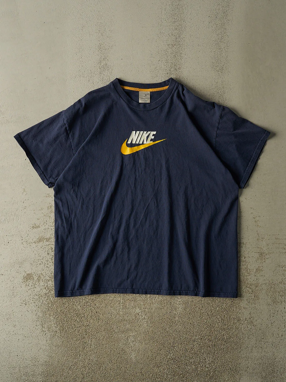 Vintage Y2K Navy Blue Nike Logo Tee (XXL) sold by Rebalance Vintage