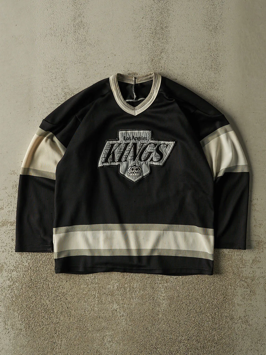 Vintage 90s Black Los Angeles Kings Hockey Jersey (S/M) sold by Rebalance Vintage