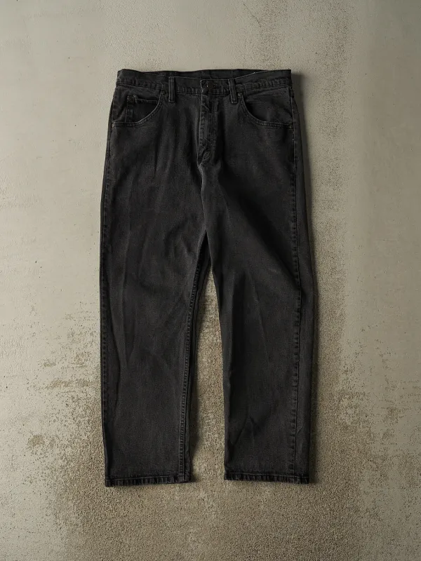 Vintage 90s Faded Black Wrangler Denim Pants (33x29) sold by Rebalance Vintage