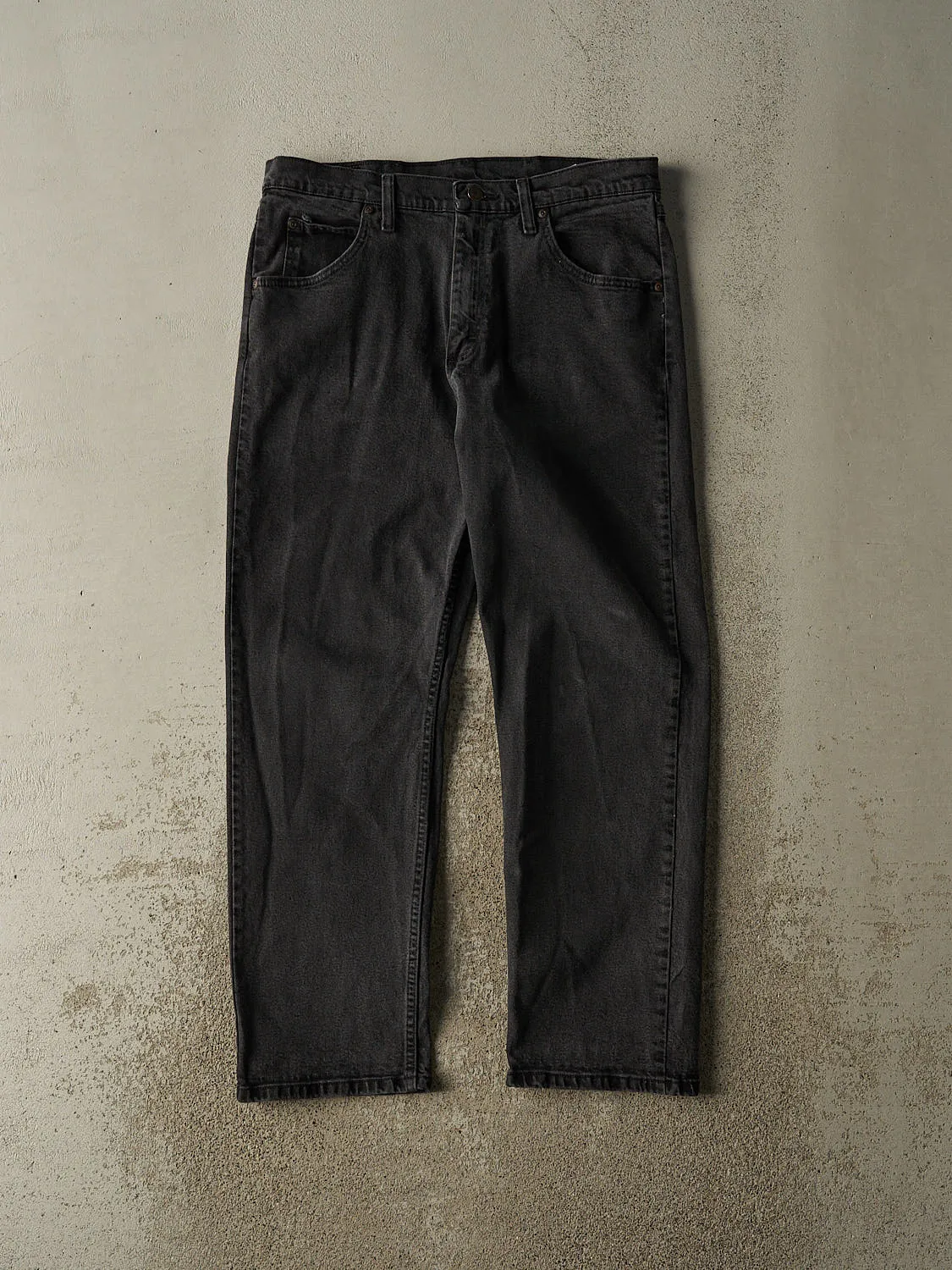 Vintage 90s Faded Black Wrangler Denim Pants (33x29) sold by Rebalance Vintage
