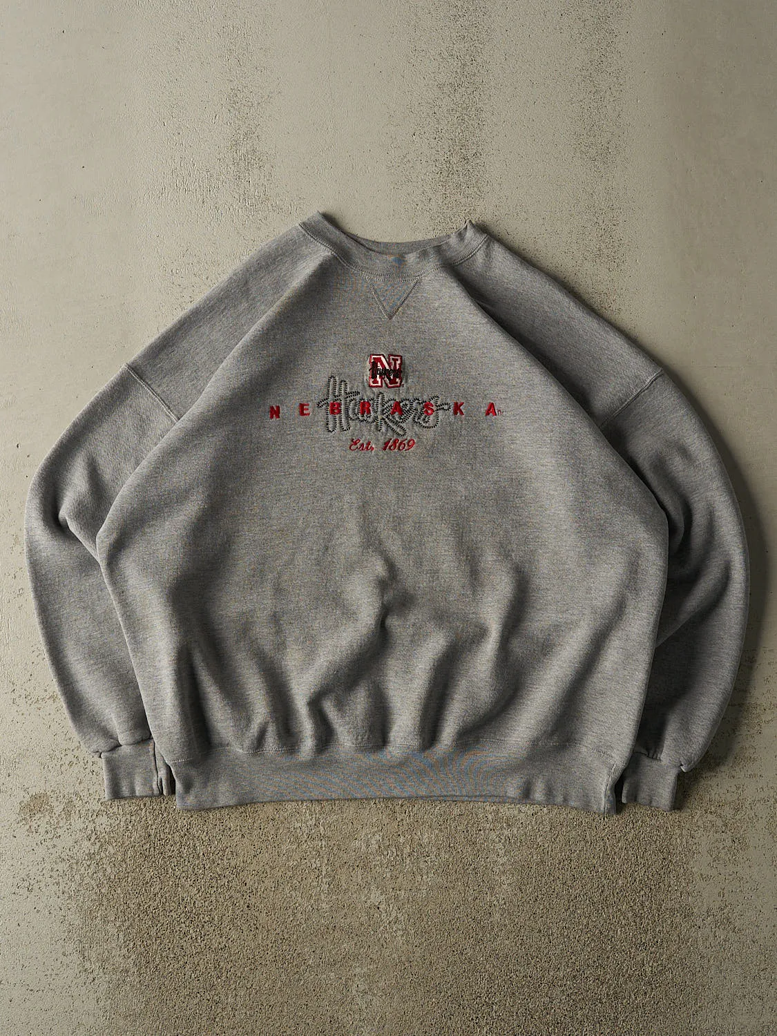Vintage 90s Grey University of Nebraska Corn Huskers Crewneck (XXL/XXXL) sold by Rebalance Vintage