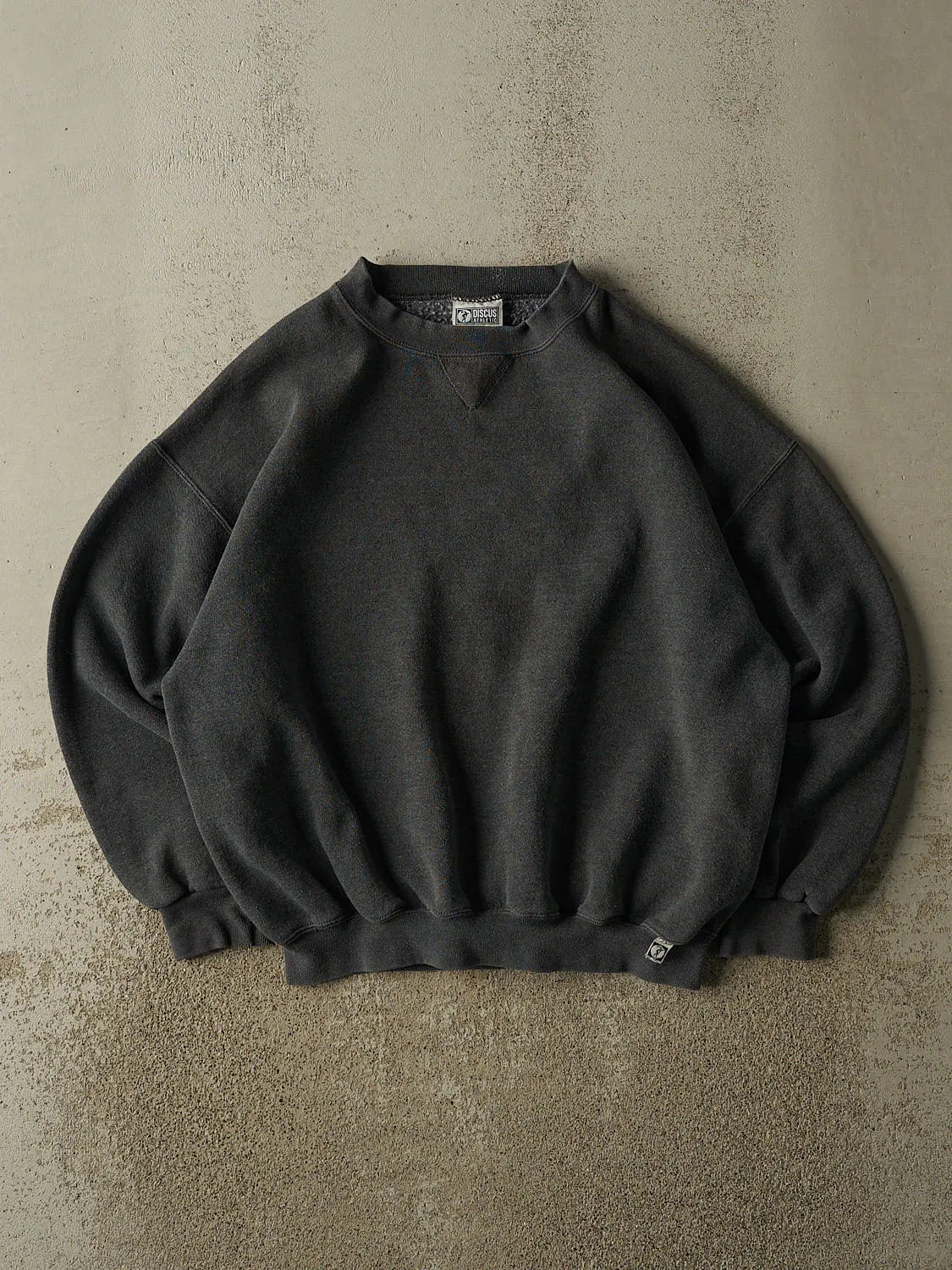 Vintage 90s Charcoal Grey Discus Athletic Blank Crewneck (L) sold by Rebalance Vintage