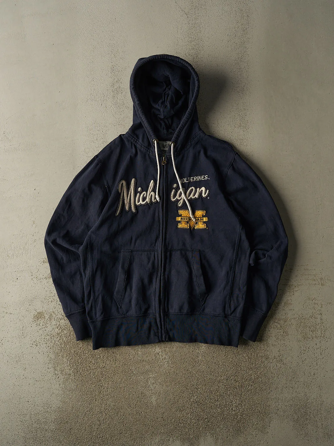 Vintage 90s Navy Blue Michigan Wolverines Zip Up Hoodie (XL/XXL) sold by Rebalance Vintage