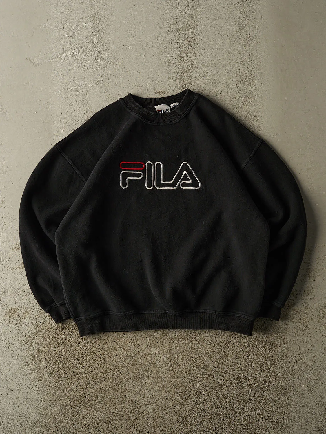 Vintage 90s Black Fila Embroidered Crewneck (L/XL) sold by Rebalance Vintage