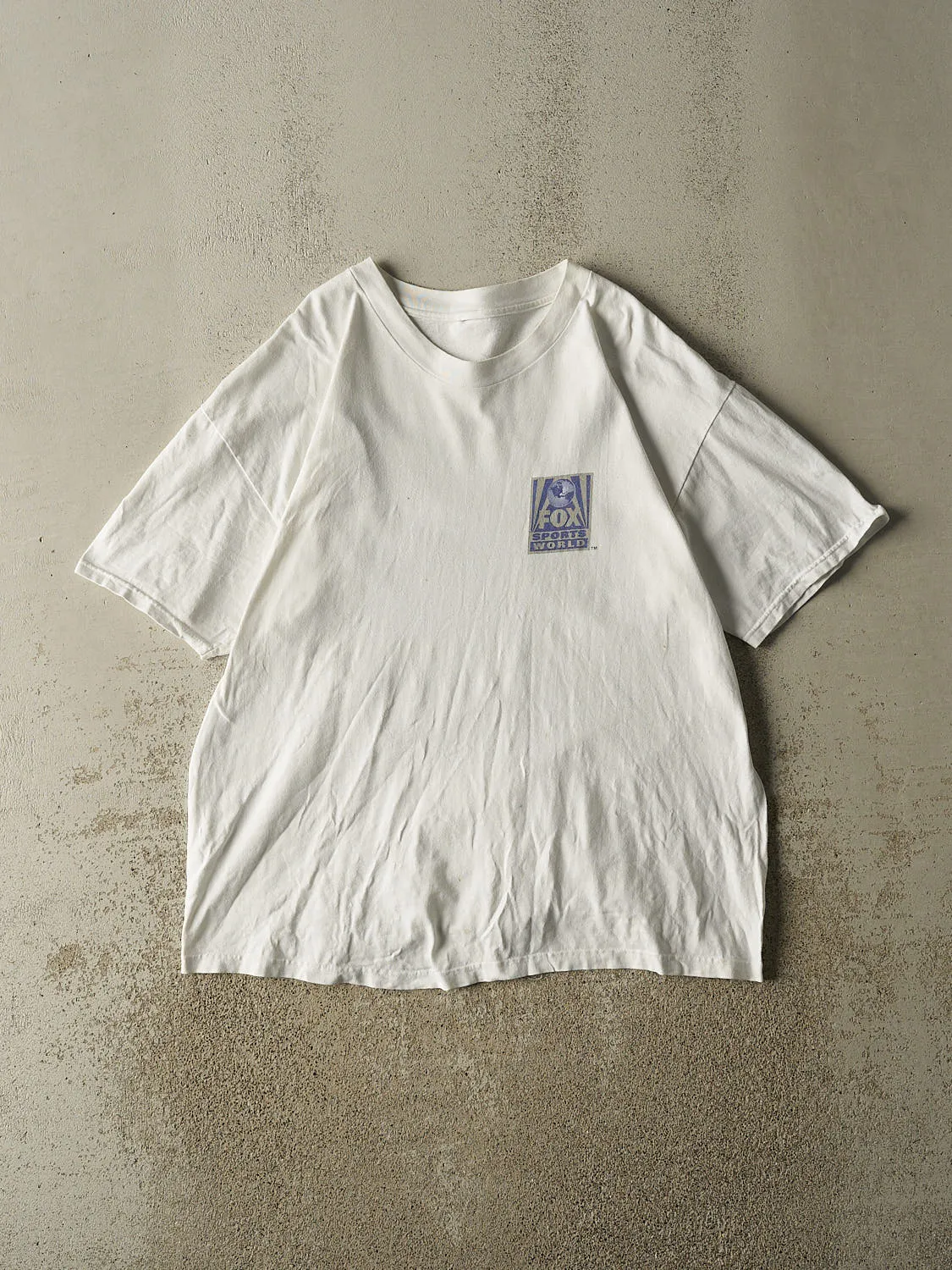 Vintage 90s White Fox Sports World Tee (L/XL) sold by Rebalance Vintage