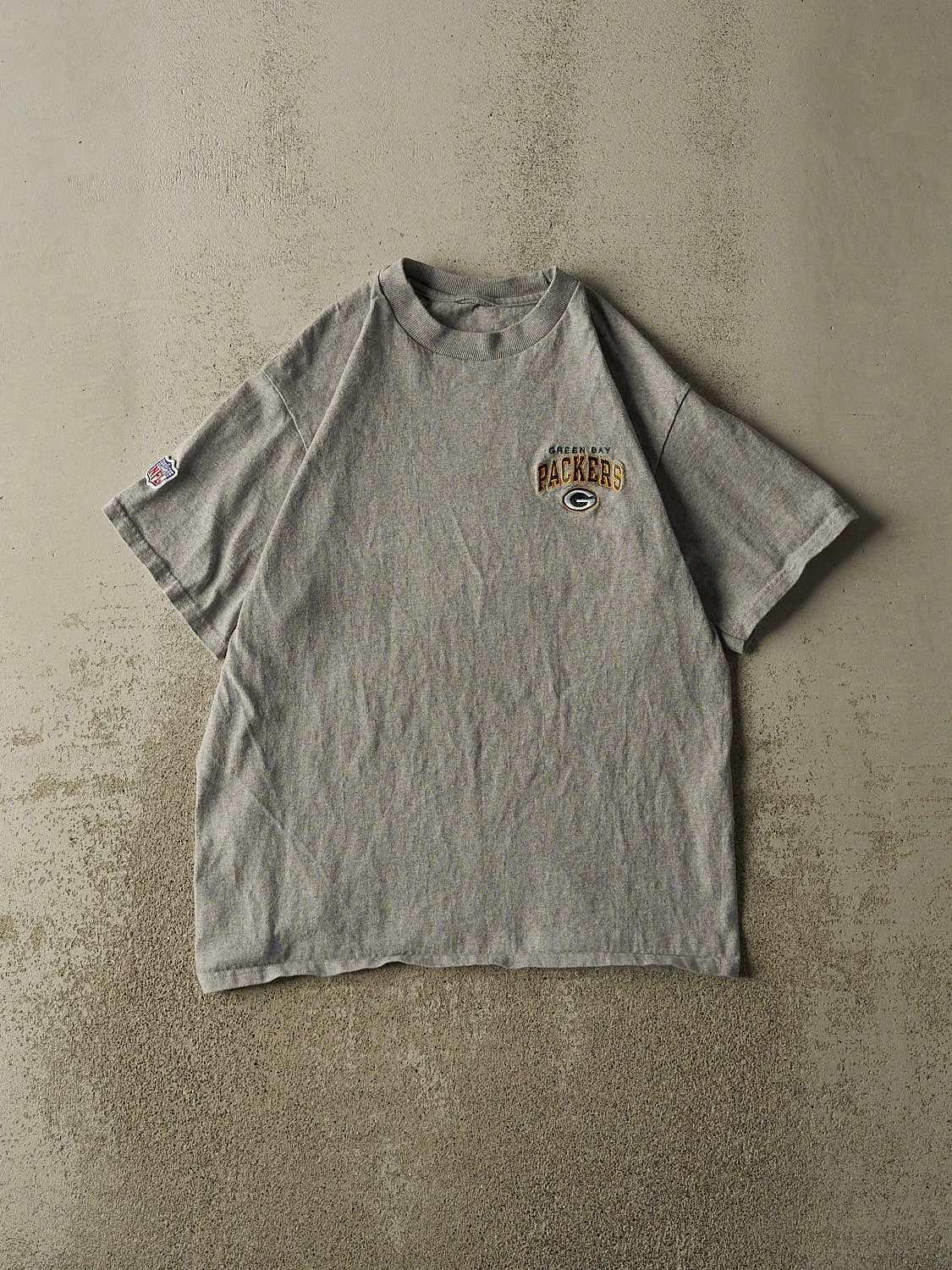 Vintage 90s Grey Green Bay Packers Embroidered Tee (M) sold by Rebalance Vintage