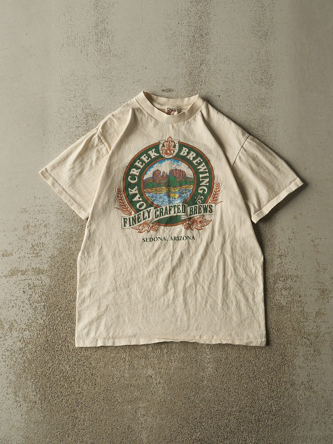 Vintage 90s Beige Oak Creek Brewing Tee (S/M) sold by Rebalance Vintage