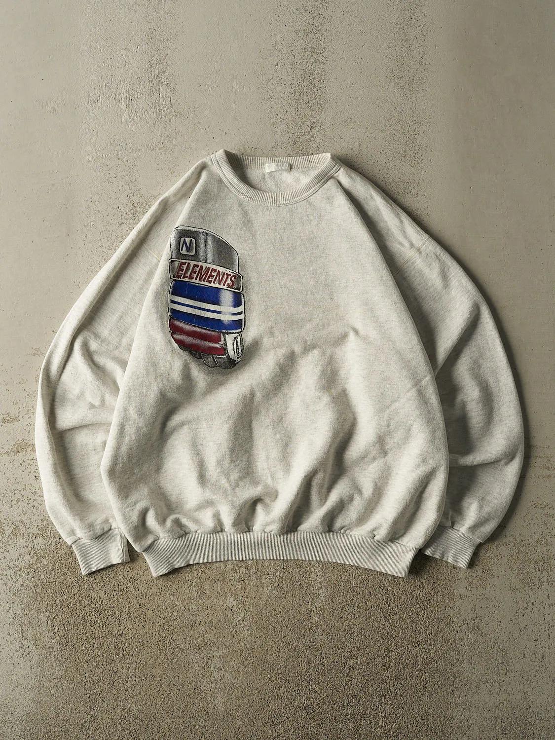 Vintage 90s Heather Grey Northern Elements Hockey Crewneck (L/XL) sold by Rebalance Vintage