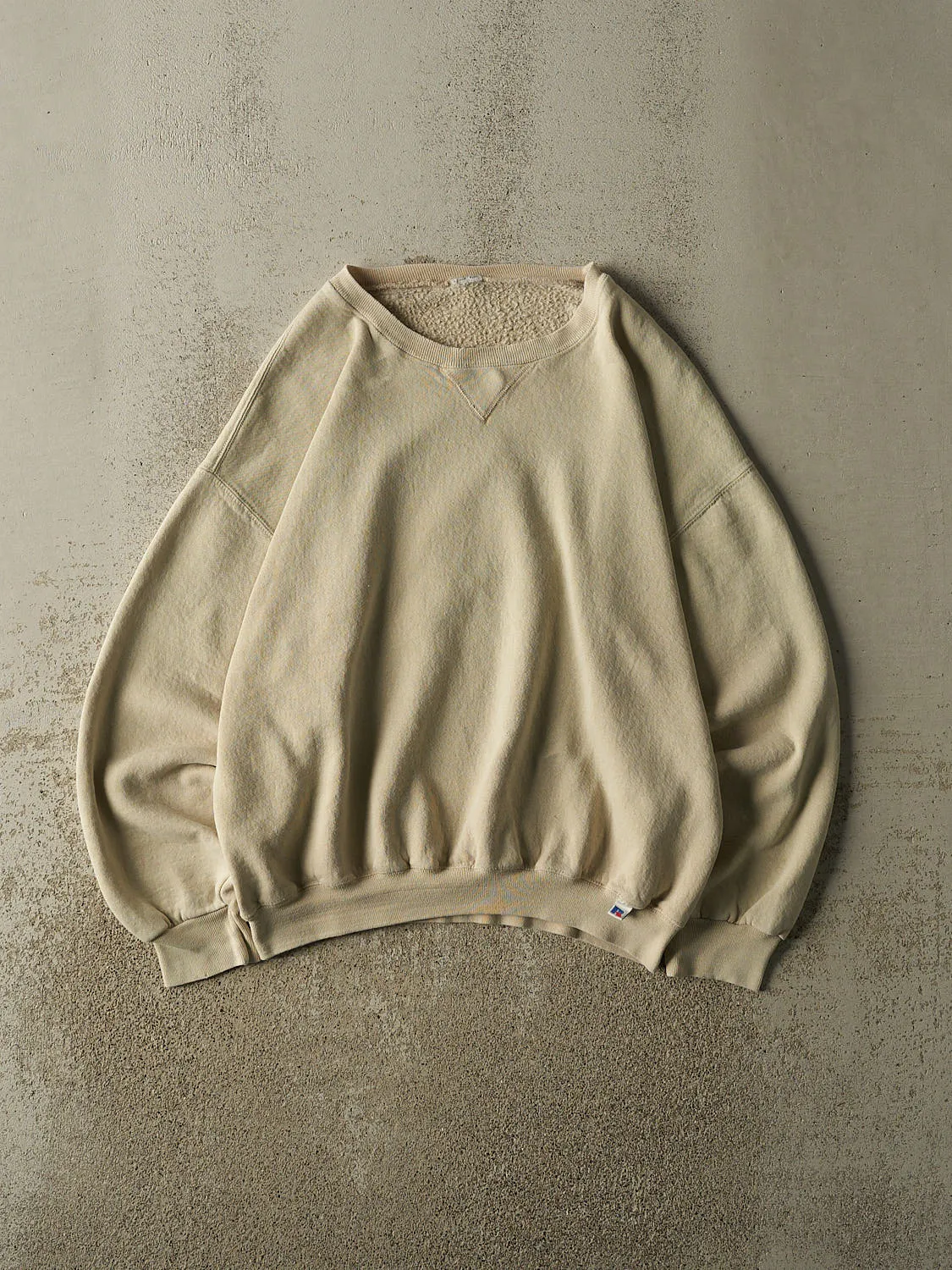 Vintage 90s Beige Russell Athletic Blank Crewneck (L/XL) sold by Rebalance Vintage