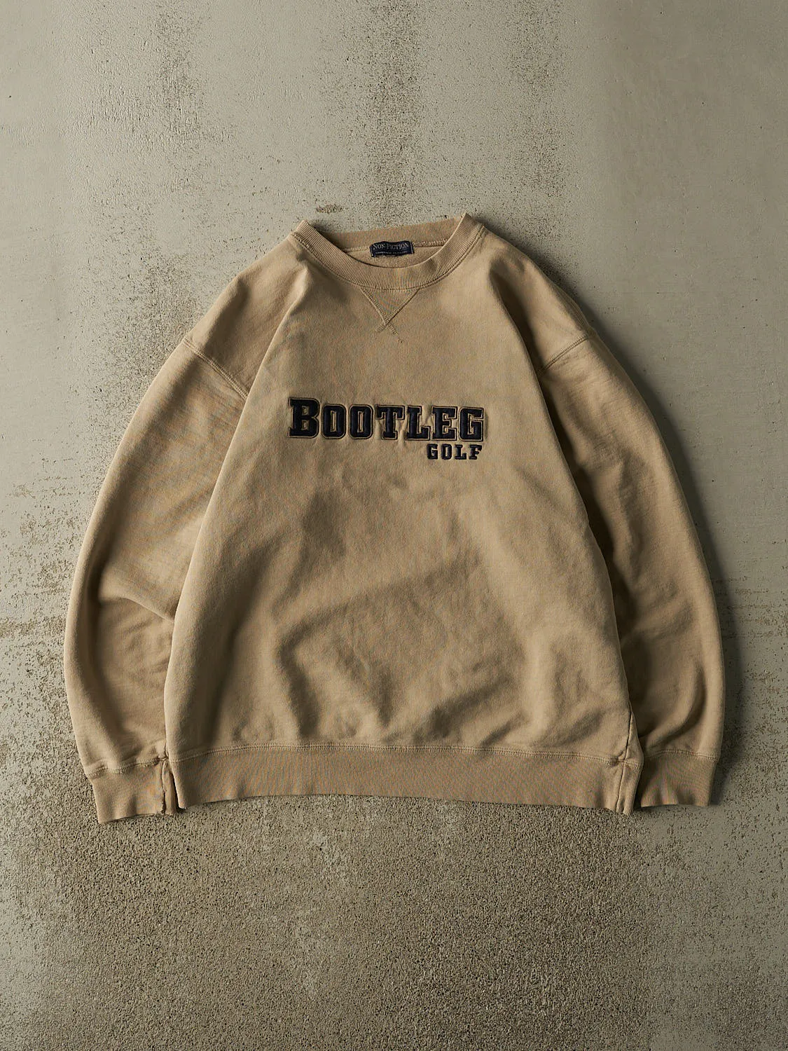 Vintage 90s Beige Bootleg Golf Embroidered Crewneck (L) sold by Rebalance Vintage