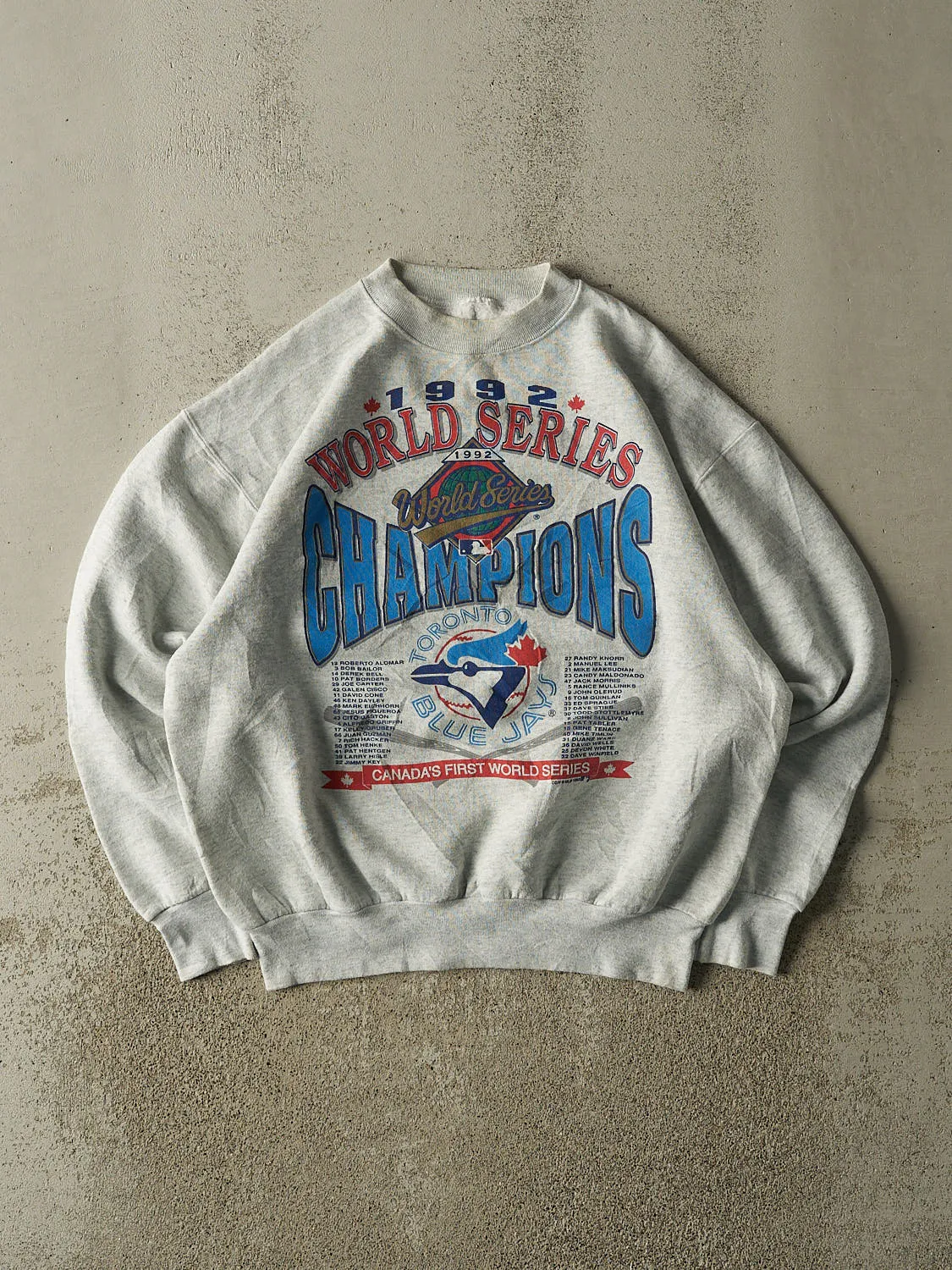Vintage 92' Heather Grey Toronto Blue Jays World Series Champions Crewneck (L/XL) sold by Rebalance Vintage
