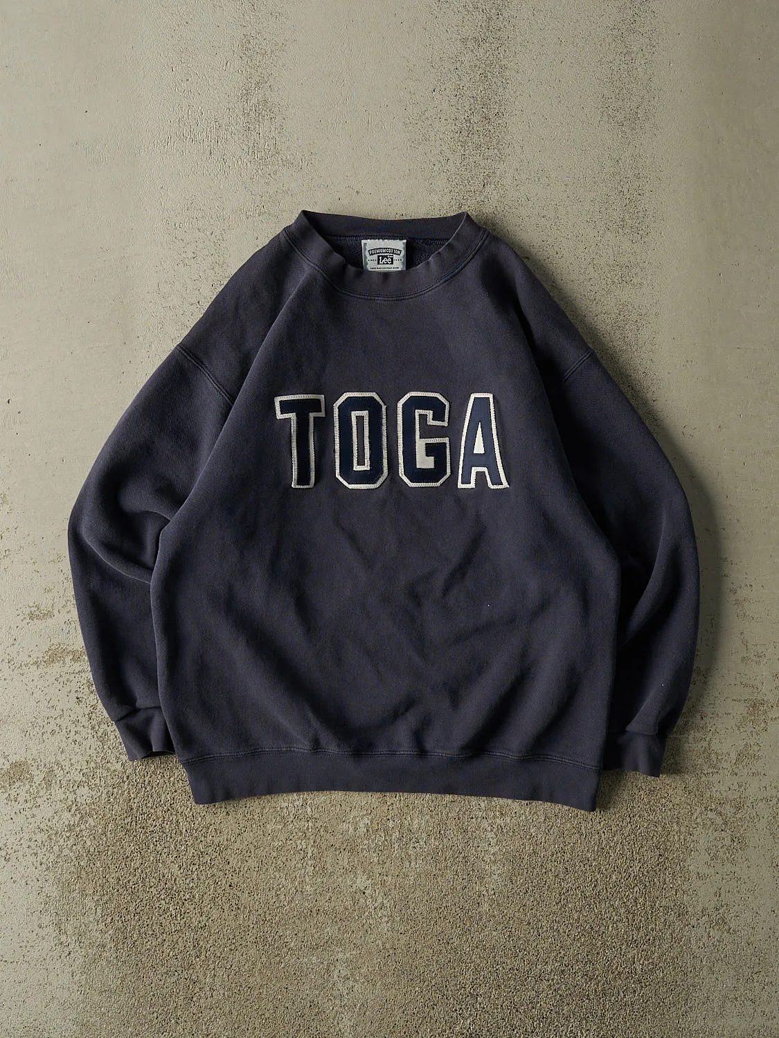 Vintage 90s Navy Blue Toga Embroidered Crewneck (M/L) sold by Rebalance Vintage