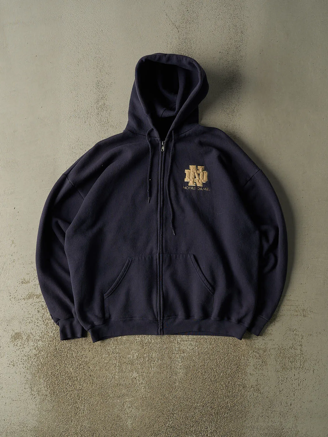 Vintage 90s Navy Blue University of Notre Dame Zip Up Hoodie (XL/XXL) sold by Rebalance Vintage