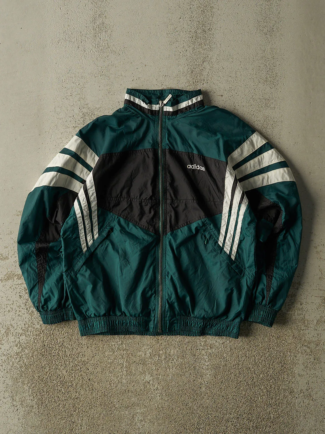 Vintage 90s Green Adidas Embroidered Windbreaker Jacket (XS/S) sold by Rebalance Vintage