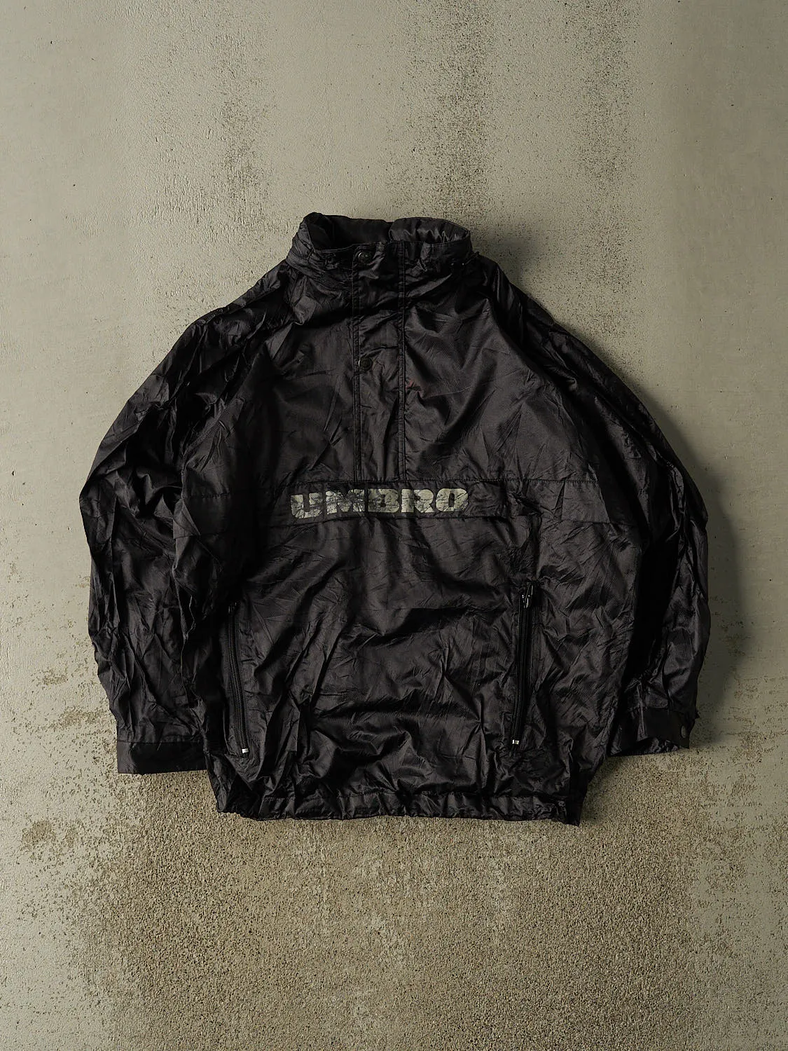 Vintage 90s Black Umbro Quarter Zip Nylon Windbreaker Jacket (M) sold by Rebalance Vintage