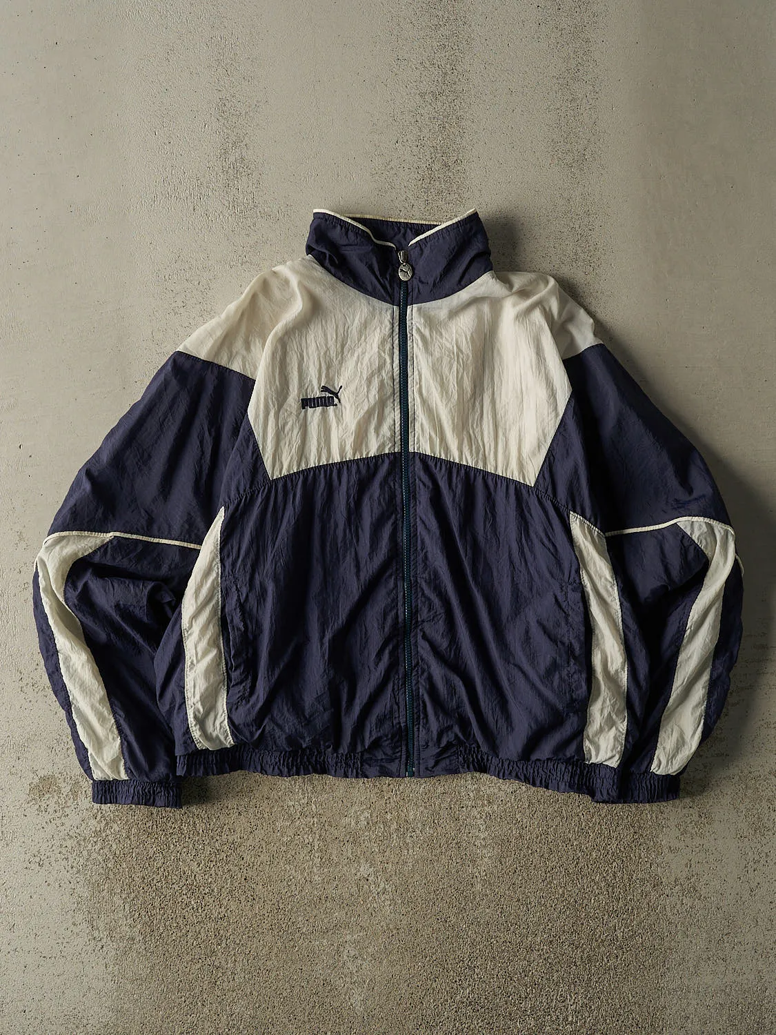 Vintage 90s Navy Blue & White Puma Zip Up Windbreaker Jacket (M/L) sold by Rebalance Vintage