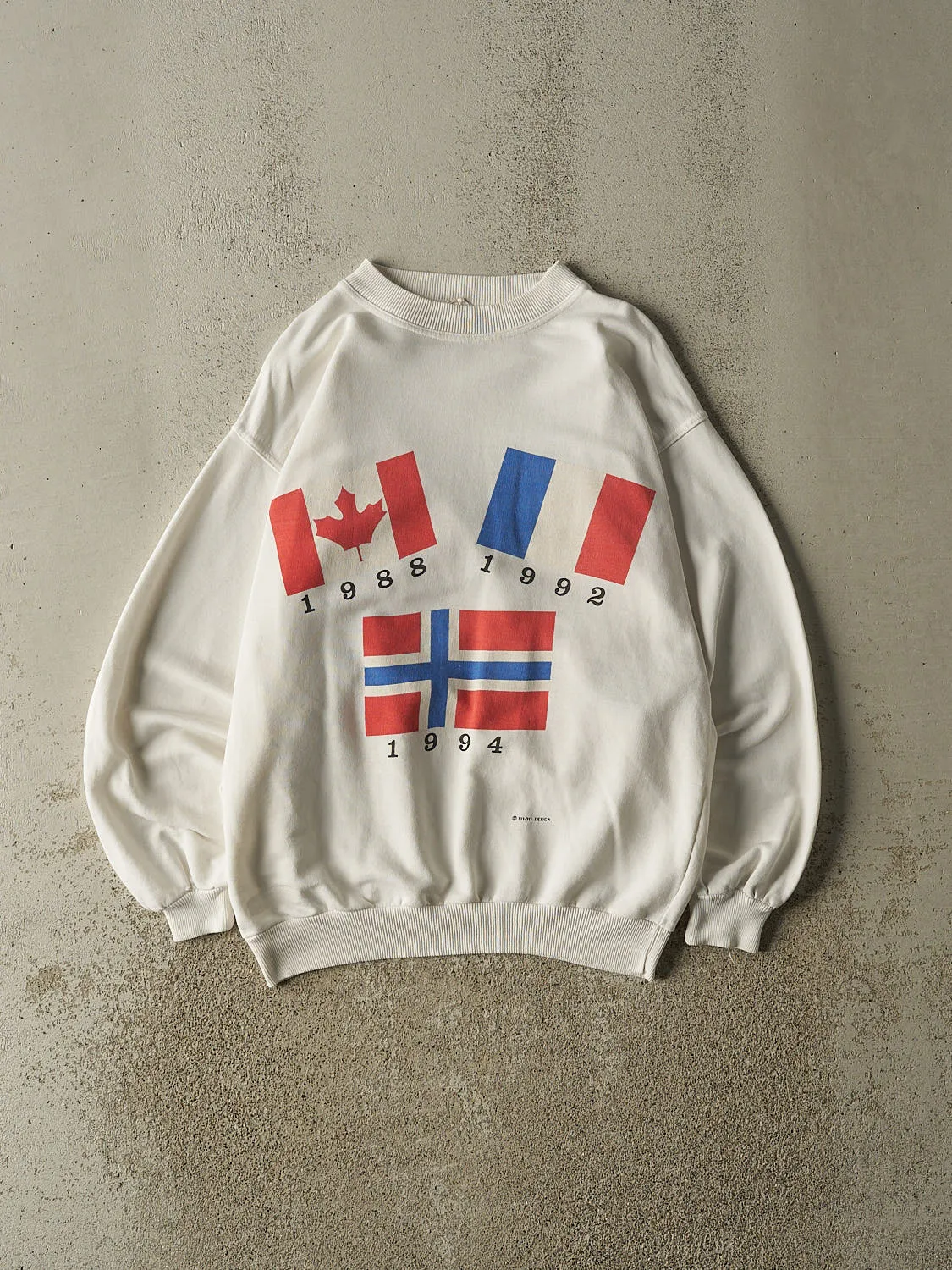 Vintage 90s White World Flags Crewneck (M/L) sold by Rebalance Vintage