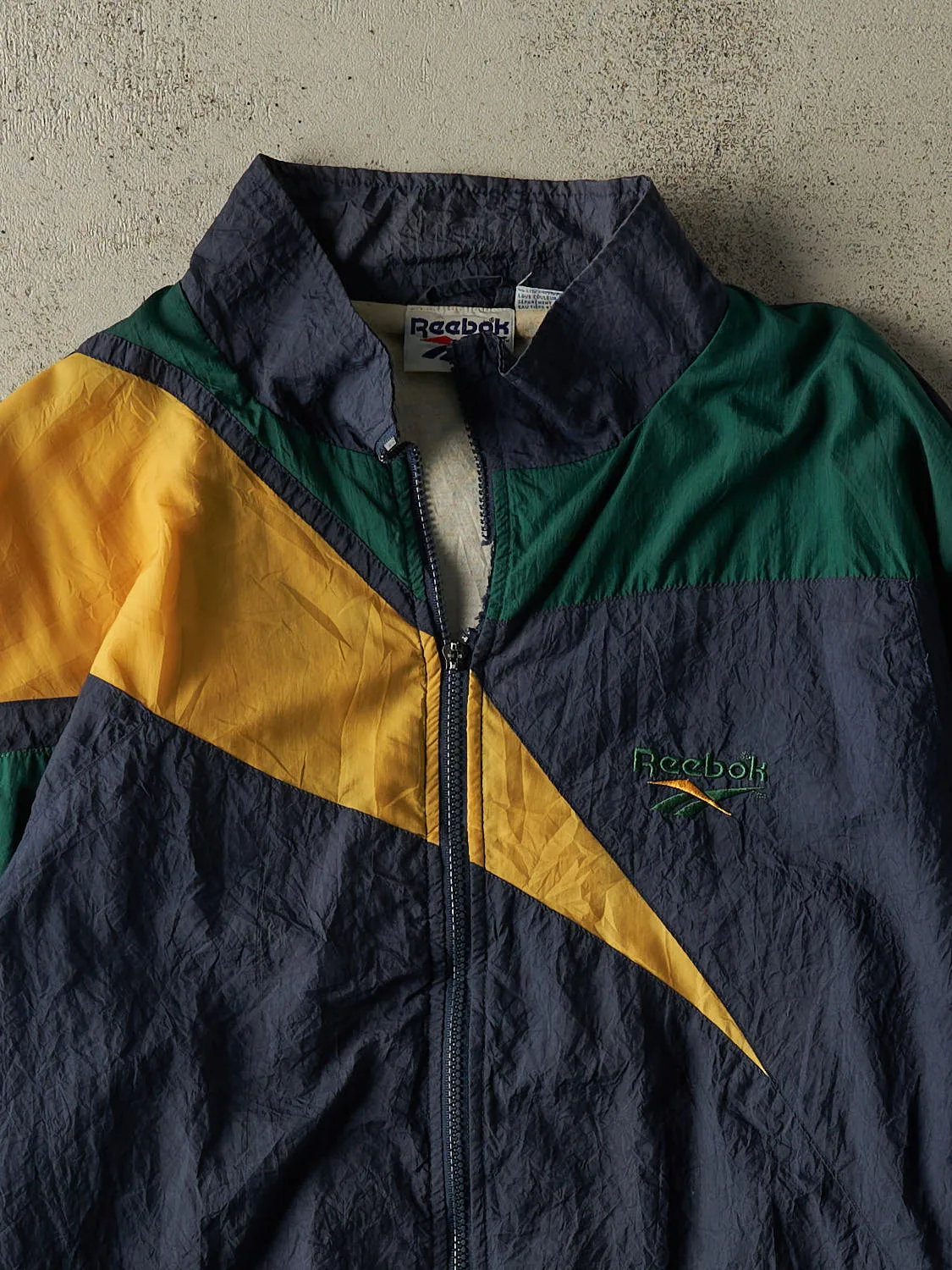 Vintage 90s Navy Blue Colour Block Reebok Windbreaker Jacket (L/XL) sold by Rebalance Vintage product image thumbnail 3