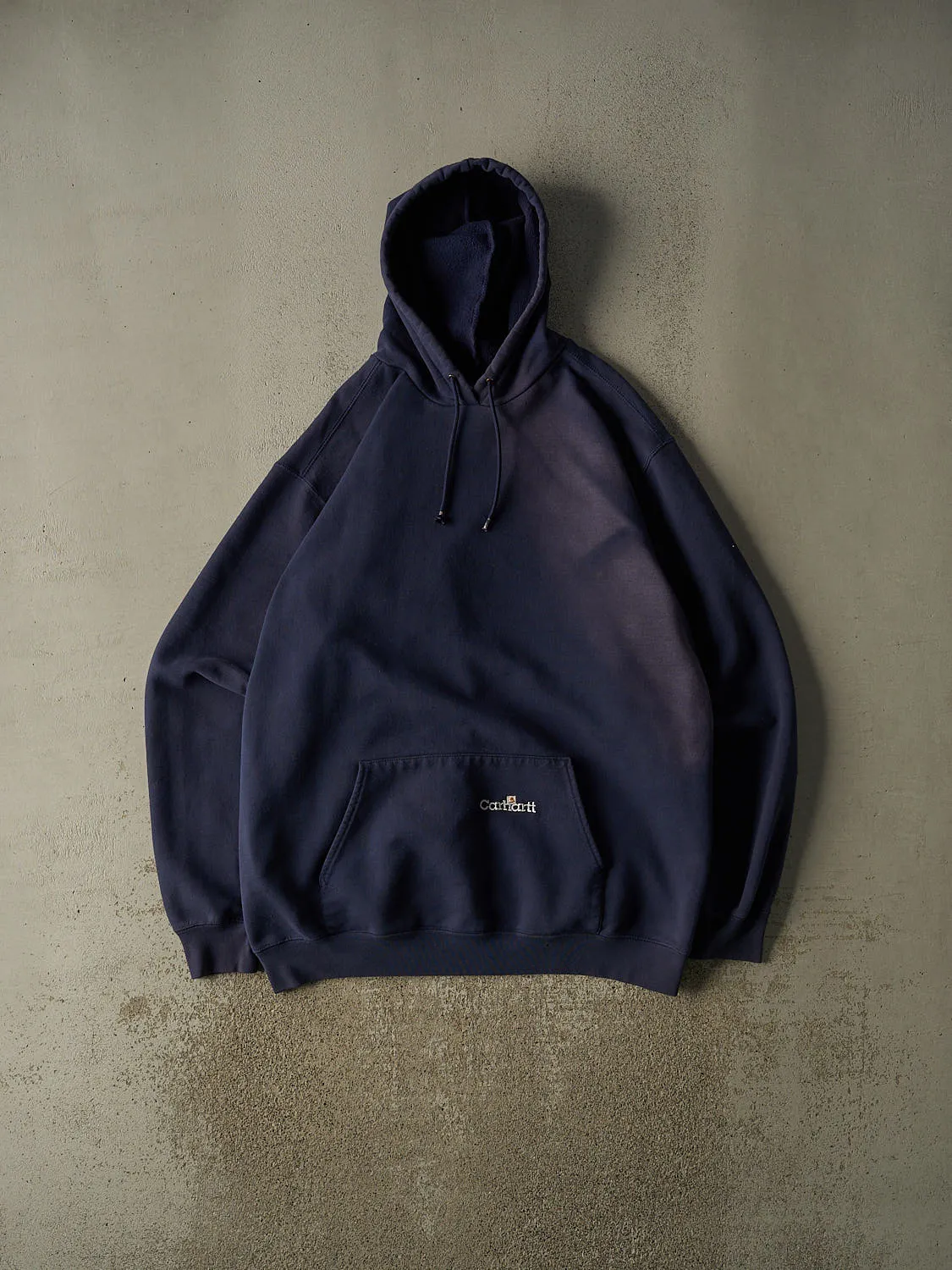 Vintage 90s Sun Faded Navy Carhartt Embroidered Hoodie (XXXL) sold by Rebalance Vintage