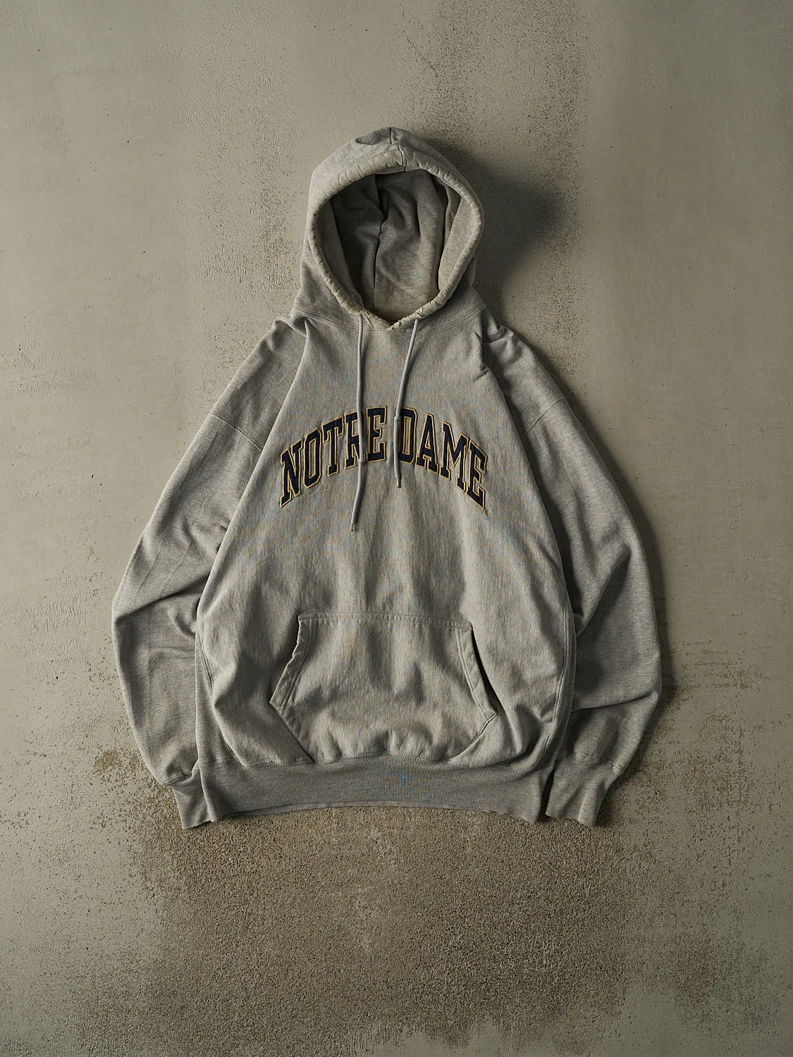 Vintage 90s Grey University of Notre Dame Hoodie (XXL) sold by Rebalance Vintage