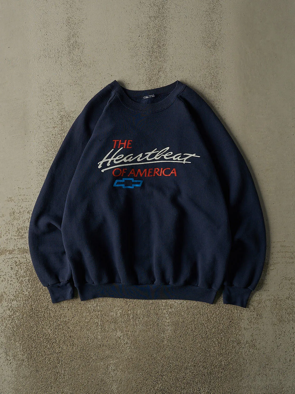 Vintage 80s Navy Blue Chevrolet The Heartbeat of America Crewneck (M) sold by Rebalance Vintage
