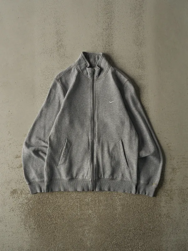 Vintage Y2K Grey Nike Swoosh Zip Up Sweater (S/M) made by Rebalance Vintage