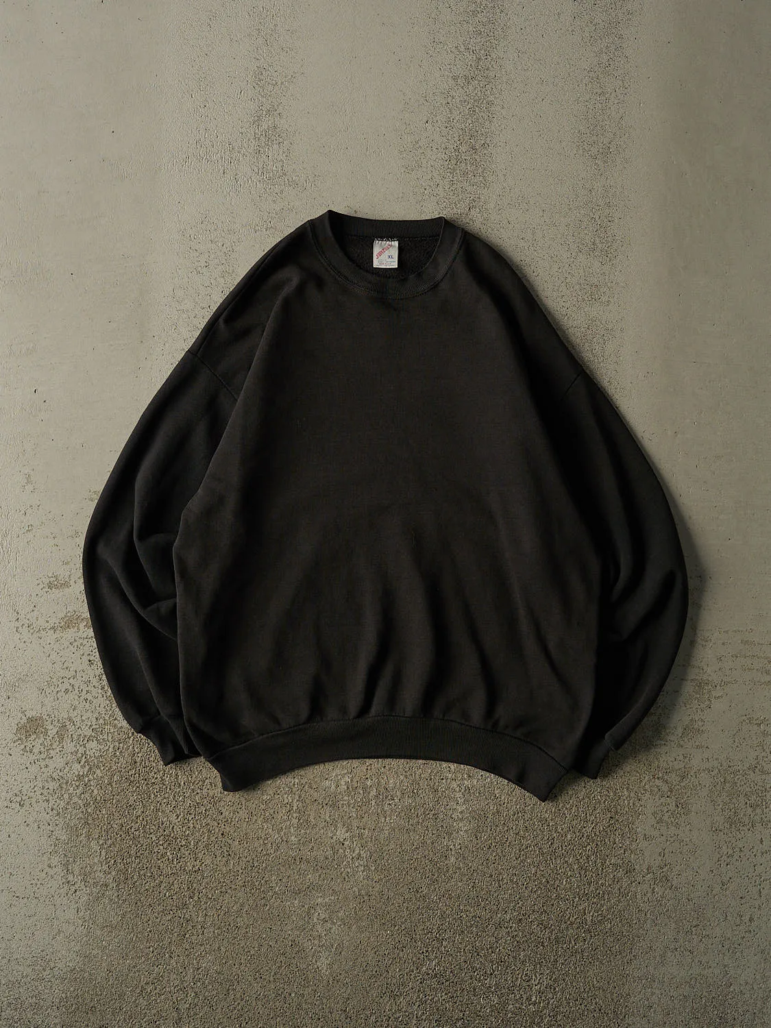 Vintage 90s Faded Black Blank Crewneck (L) sold by Rebalance Vintage
