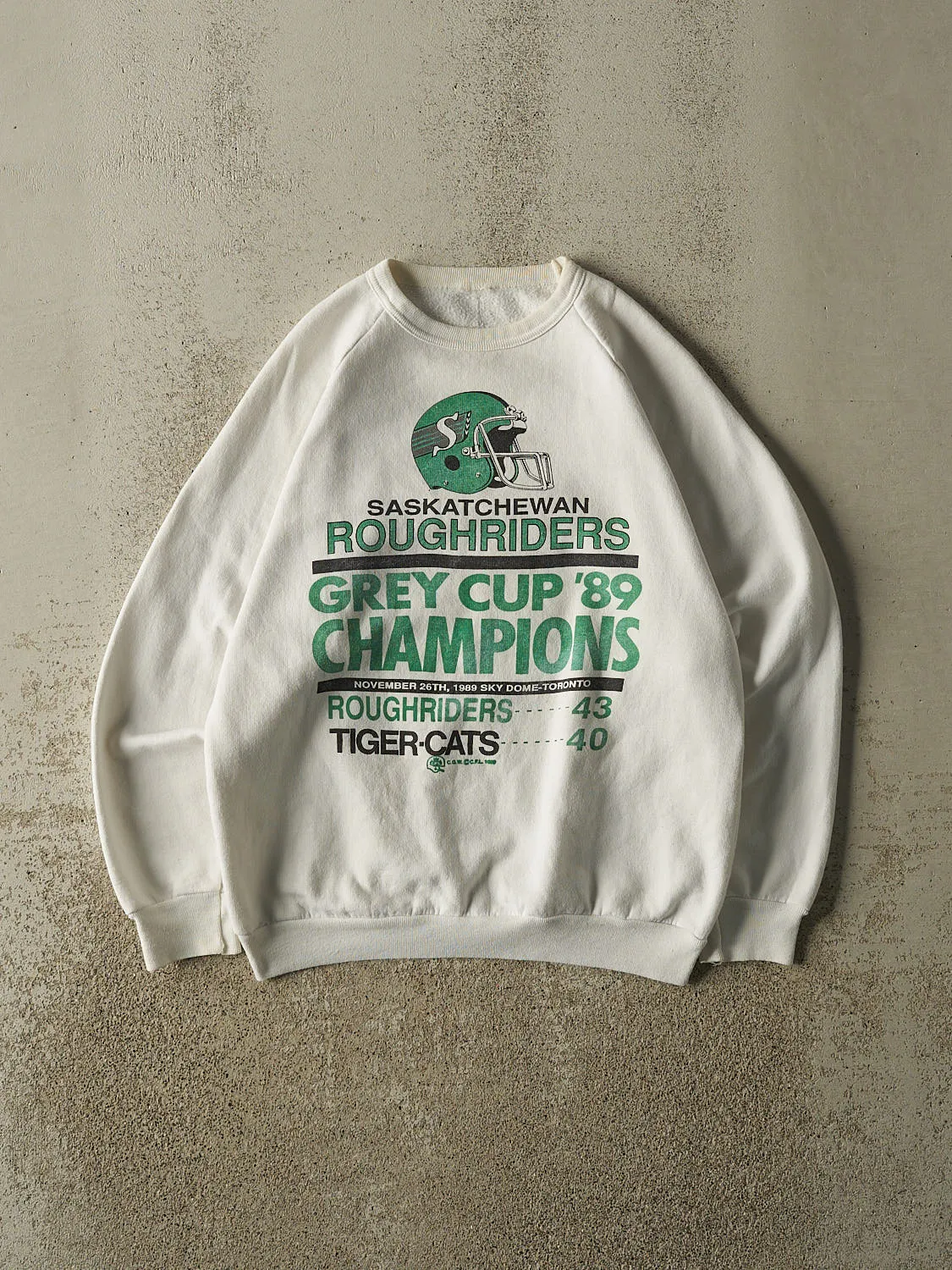 Vintage 89' White Saskatchewan Roughriders Grey Cup Champions Crewneck (S/M) sold by Rebalance Vintage