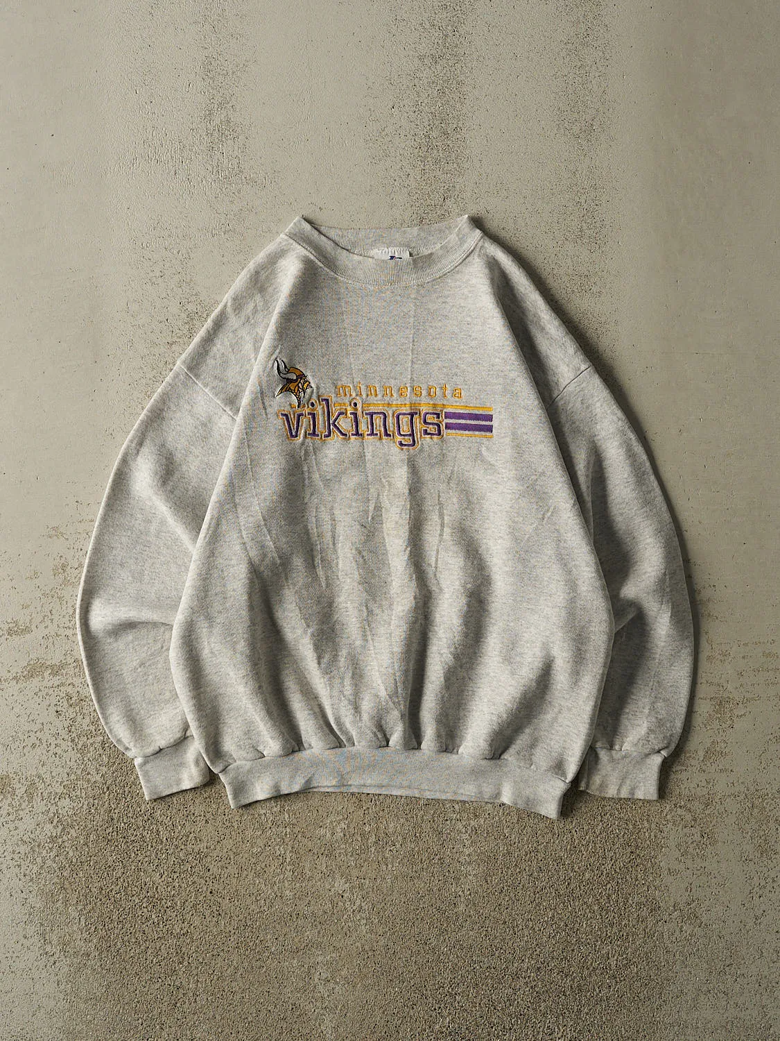 Vintage 90s Heather Grey Minnesota Vikings Embroidered Crewneck (M) sold by Rebalance Vintage