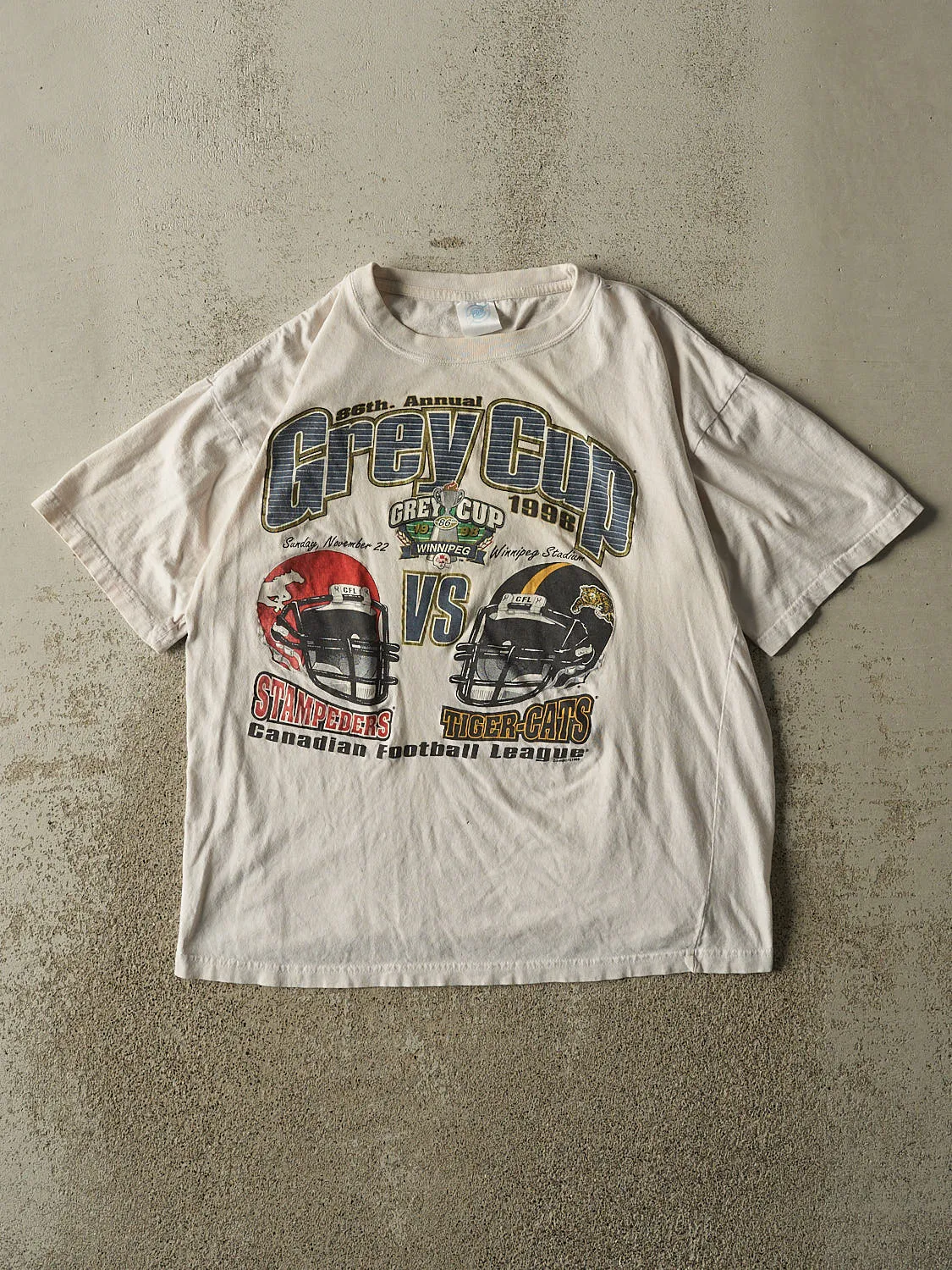 Vintage 98' Beige Winnipeg Grey Cup Tee (M) sold by Rebalance Vintage