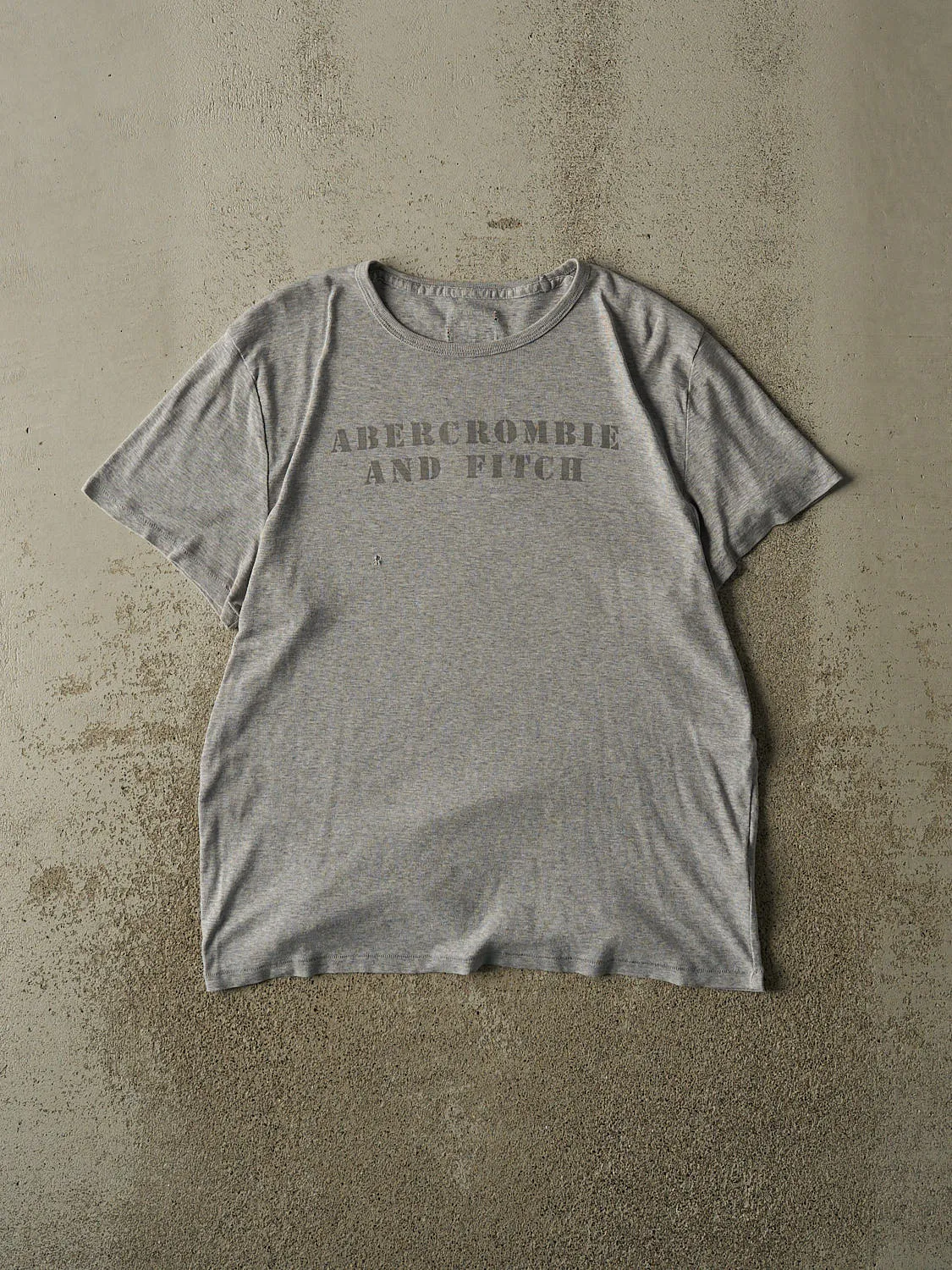 Vintage Y2K Grey Abercrombie & Fitch Tee (M) sold by Rebalance Vintage