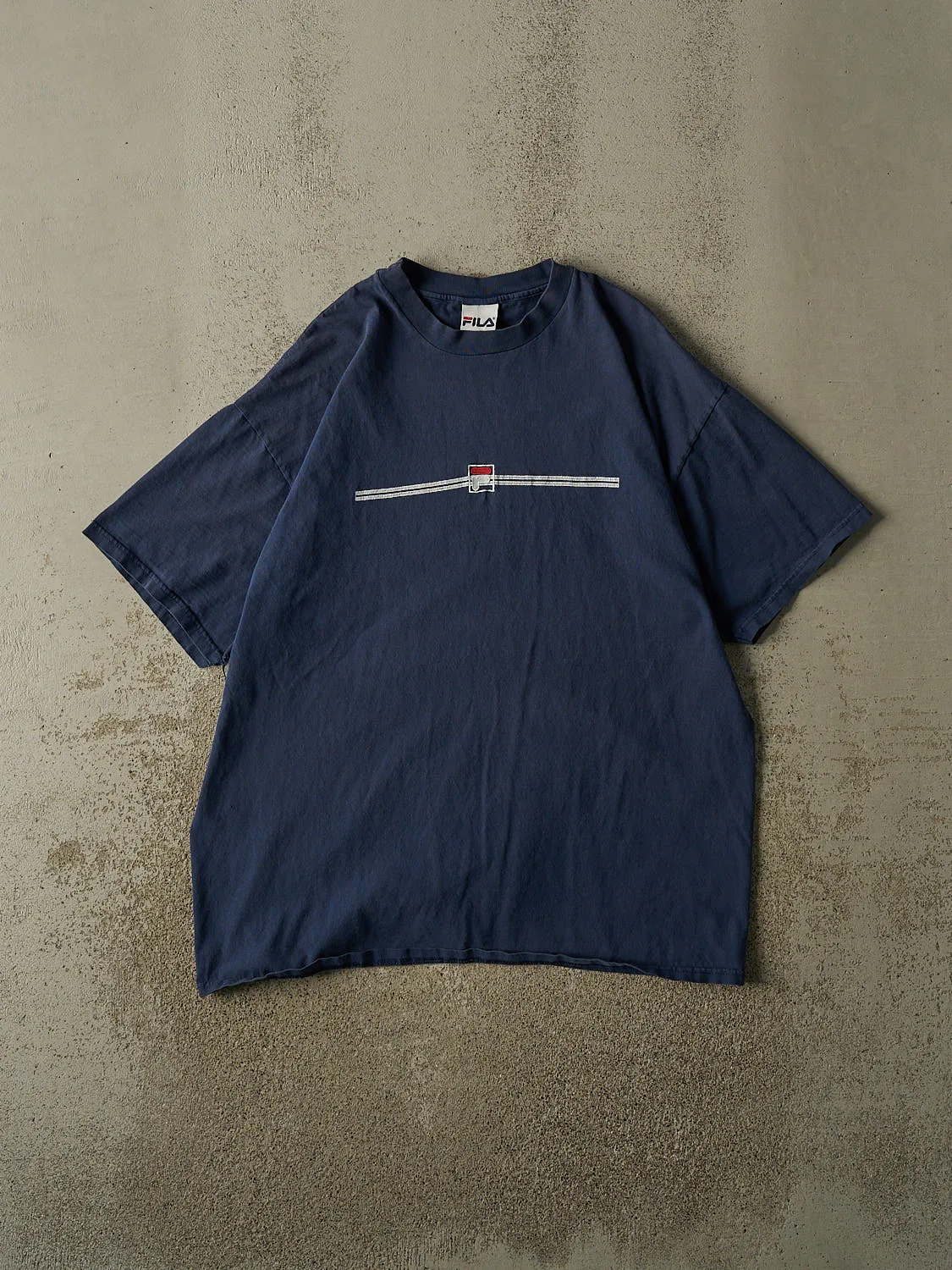Vintage 90s Navy Blue Fila Embroidered Tee (XL) sold by Rebalance Vintage
