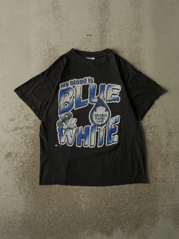 Vintage 00' Black Toronto Maple Leafs "Blue & White" Slogan Tee (L) made by Rebalance Vintage