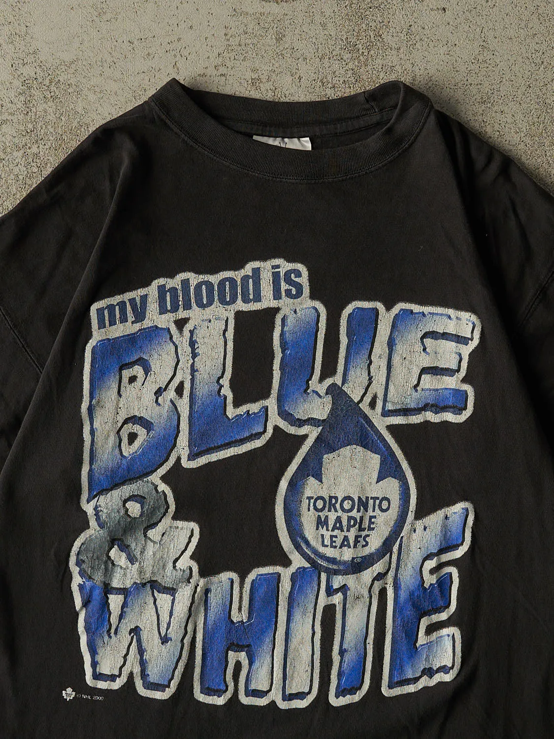 Vintage 00' Black Toronto Maple Leafs "Blue & White" Slogan Tee (L) sold by Rebalance Vintage product image thumbnail 2