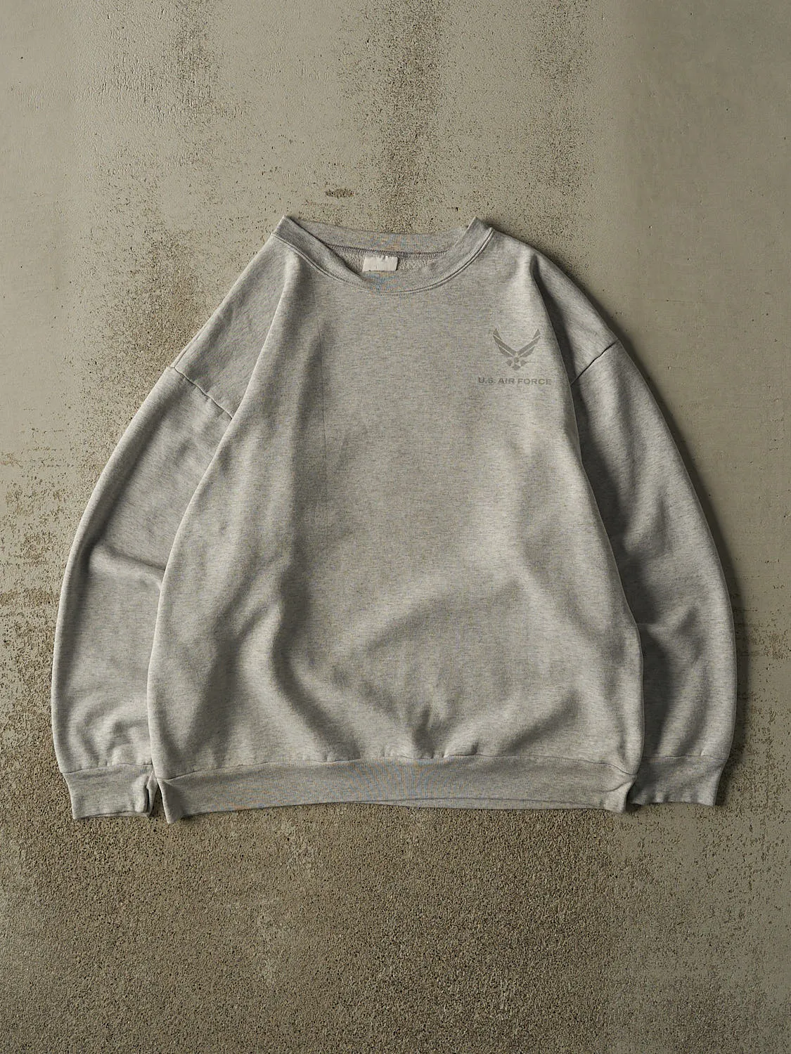 Vintage Y2K Grey US Air Force Reflective Crewneck (L/XL) sold by Rebalance Vintage