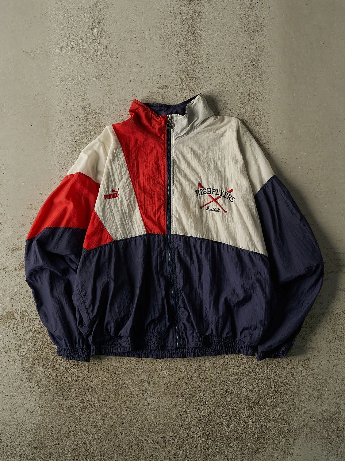 Vintage 90s Navy Blue Puma High Flyers Fastball Zip Up Windbreaker Jacket (M) sold by Rebalance Vintage
