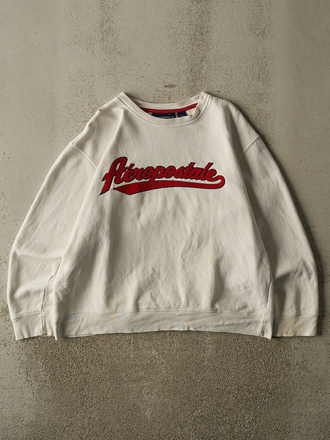 Vintage Y2K Beige Aeropostale Chenille Embroidered Crewneck (L) sold by Rebalance Vintage