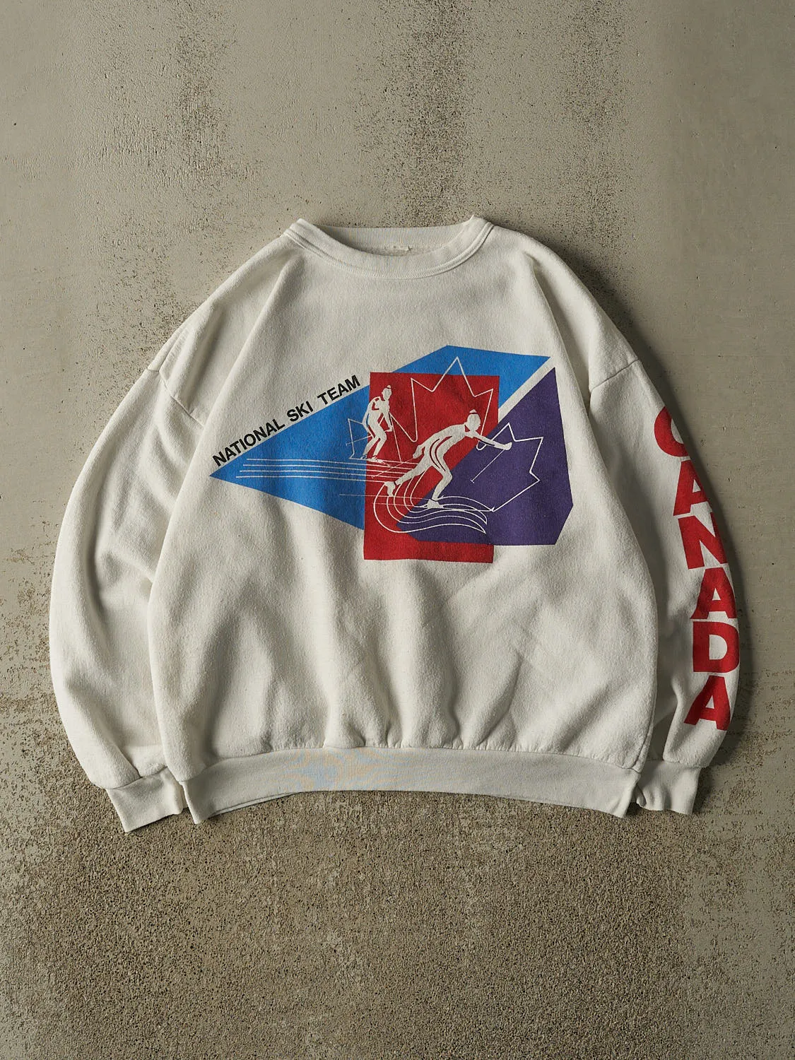 Vintage 80s White Canada National Ski Team Crewneck (S/M) sold by Rebalance Vintage