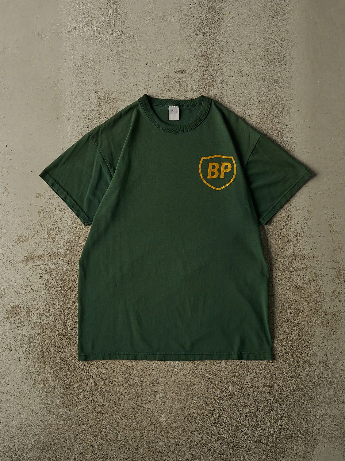 Vintage 80s Faded Green BP Logo Tee (M) sold by Rebalance Vintage