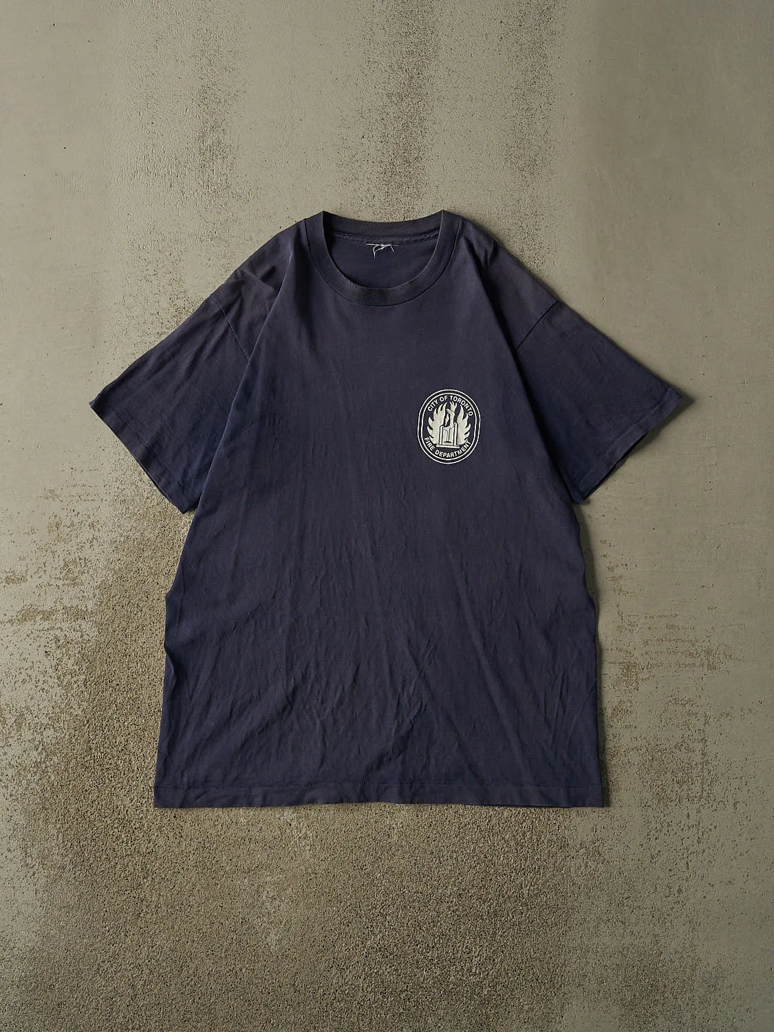 Vintage 90s Faded Navy City of Toronto Fire Dept Single Stitch Tee (XL) sold by Rebalance Vintage