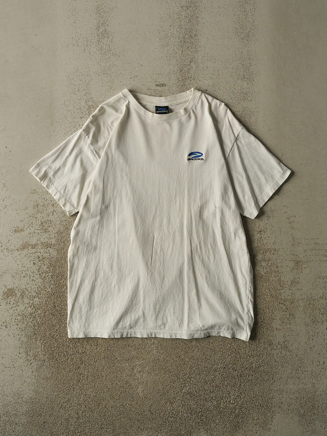 Vintage 90s White Brooks Logo Tee (L) sold by Rebalance Vintage
