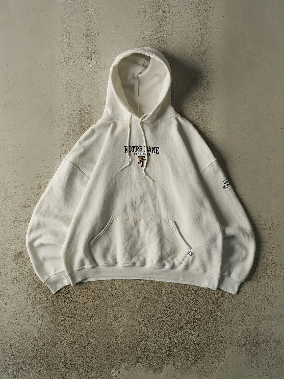 Vintage 90s White University of Notre Dame Football Russell Athletic Hoodie (L) sold by Rebalance Vintage