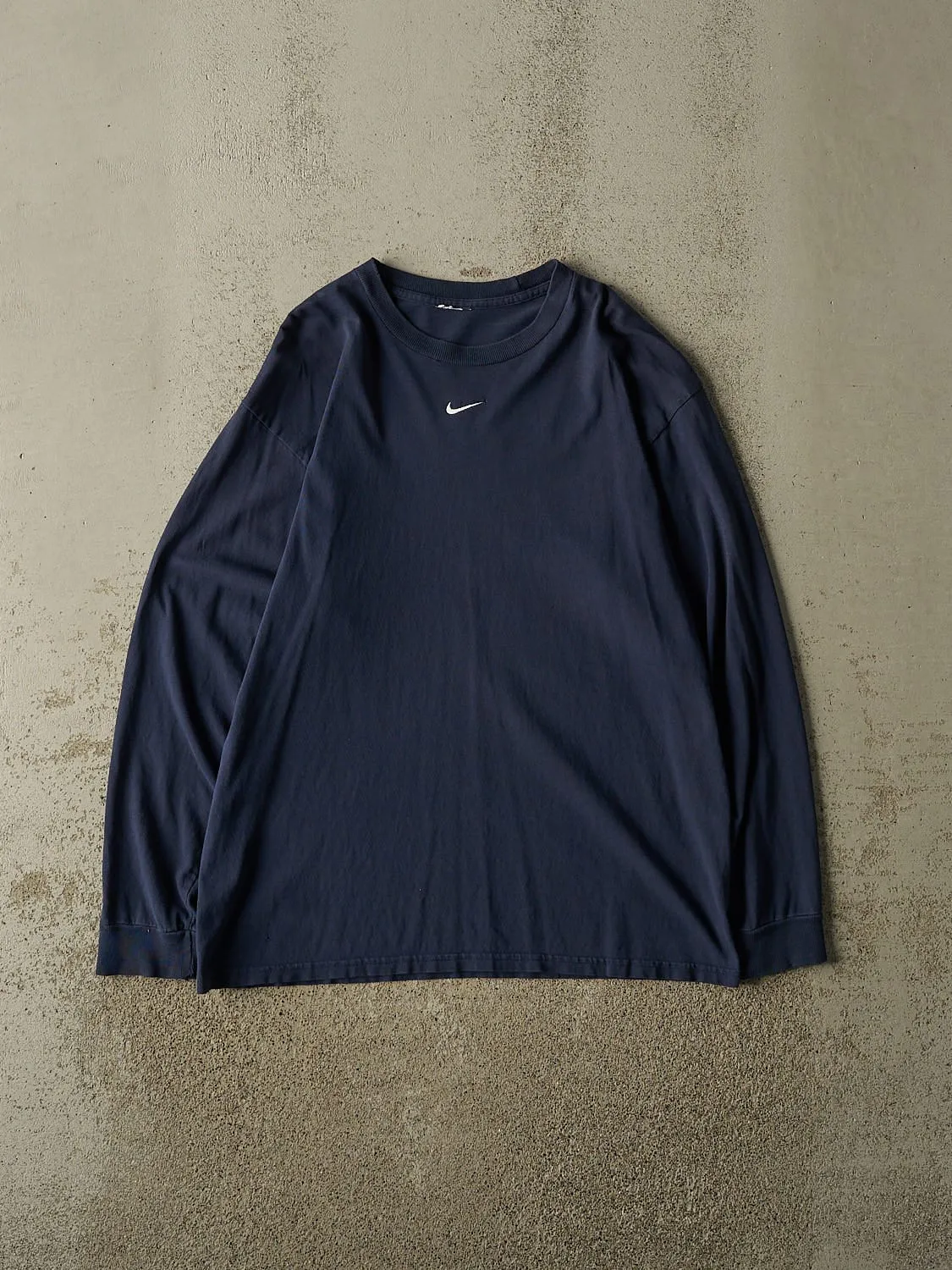 Vintage 90s Navy Blue Nike Embroidered Long Sleeve (M/L) sold by Rebalance Vintage