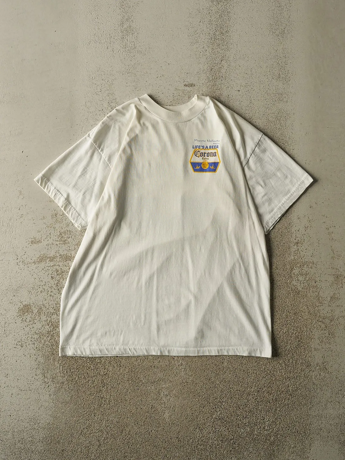 Vintage 90s White Corona Beach Club "Life's a Beer" Tee (L) sold by Rebalance Vintage