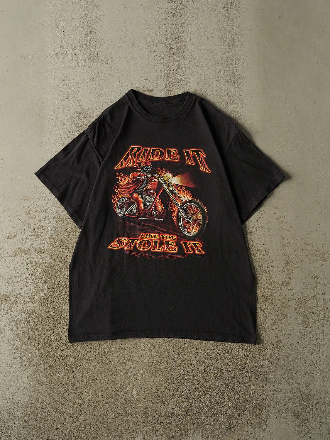 Vintage 90s Black "Ride It Like You Stole It" Biker Tee (L) sold by Rebalance Vintage
