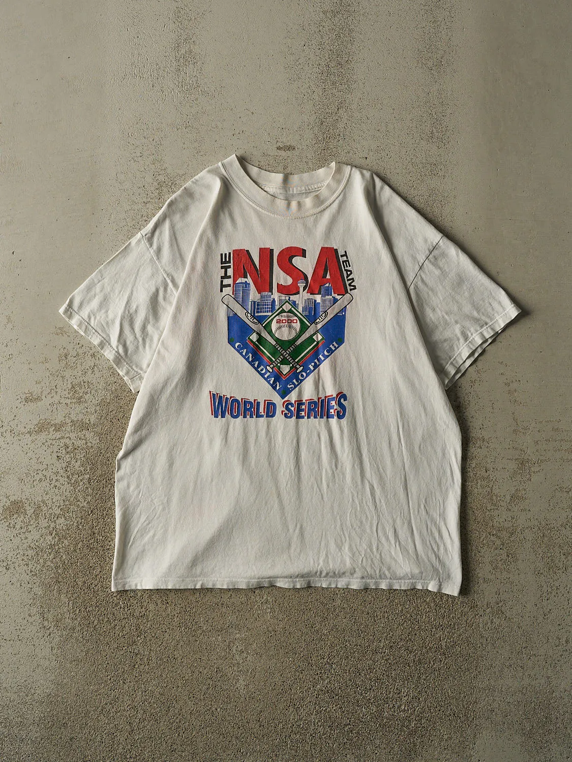 Vintage 00' White NSA Canadian Slo-Pitch Tee (L) sold by Rebalance Vintage
