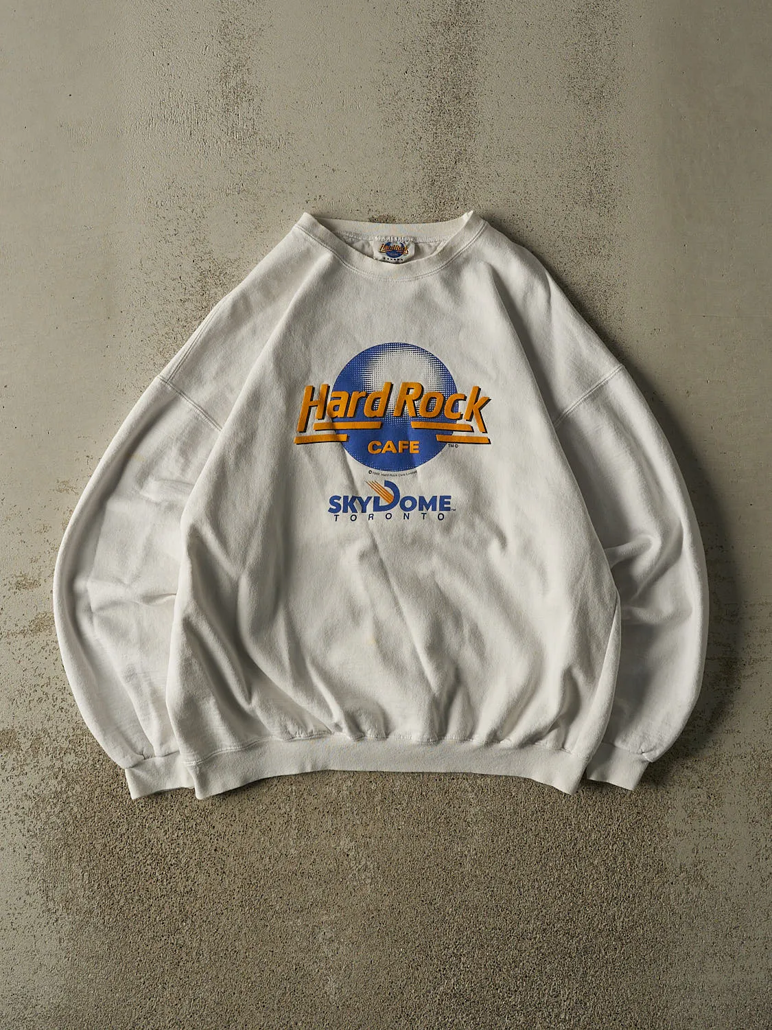 Vintage 89' White Hard Rock Cafe Sky Dome Crewneck (L/XL) sold by Rebalance Vintage